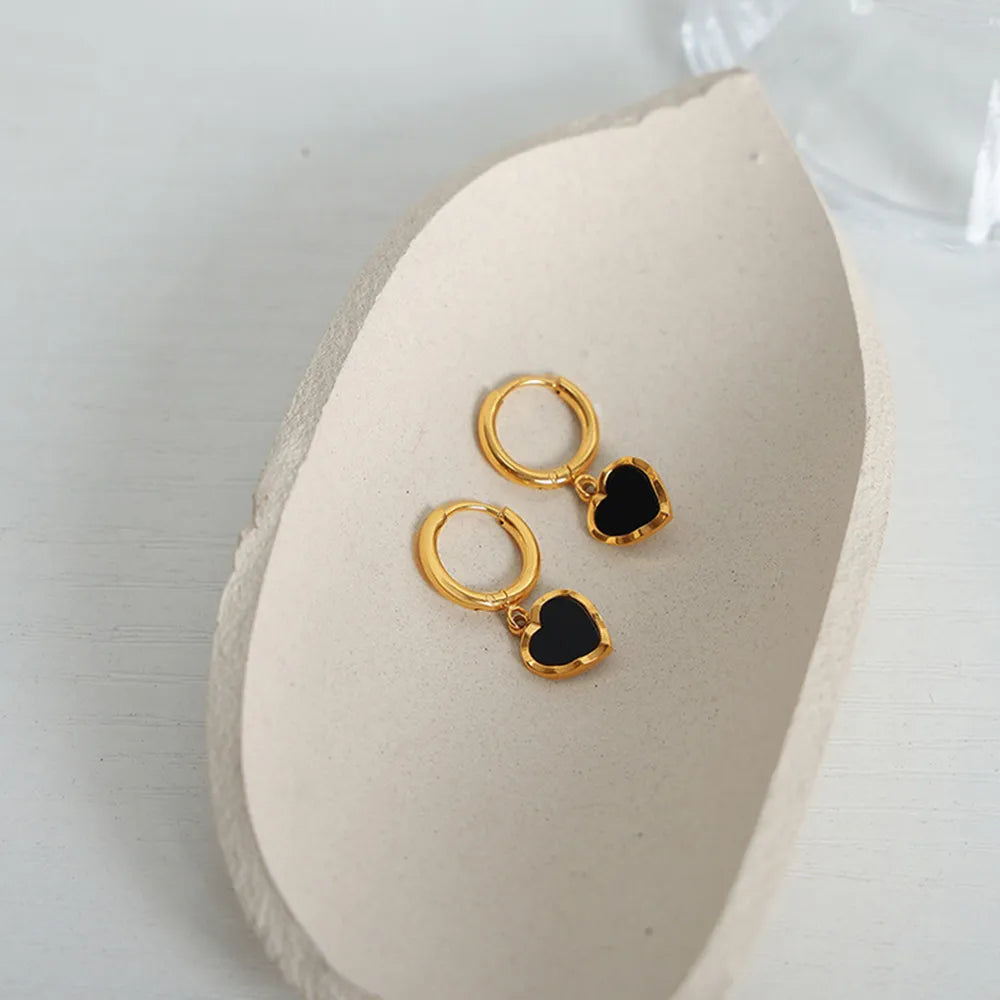 Chic Black and Gold-Tone Heart Hoop Earrings, A Stylish Twist on Classic Elegance